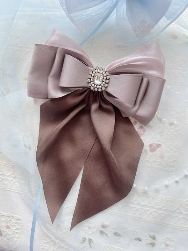 硬板立體蝴蝶結水鑽雕花彈跳夾 