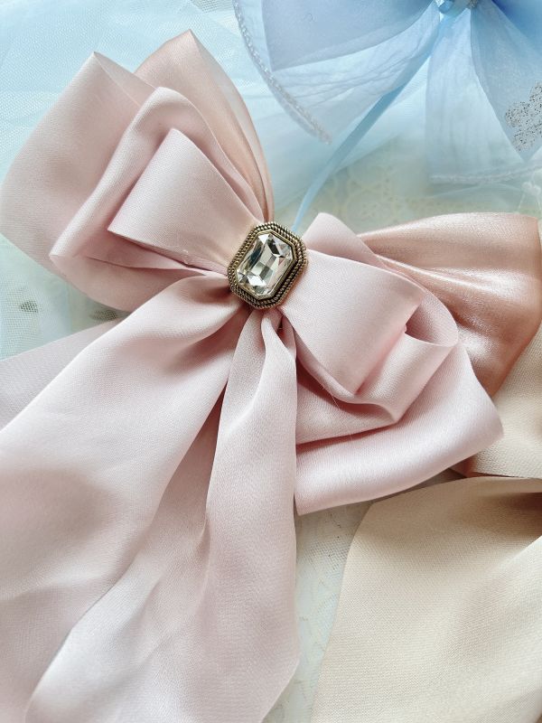 硬板立體蝴蝶結水鑽雕花彈跳夾 