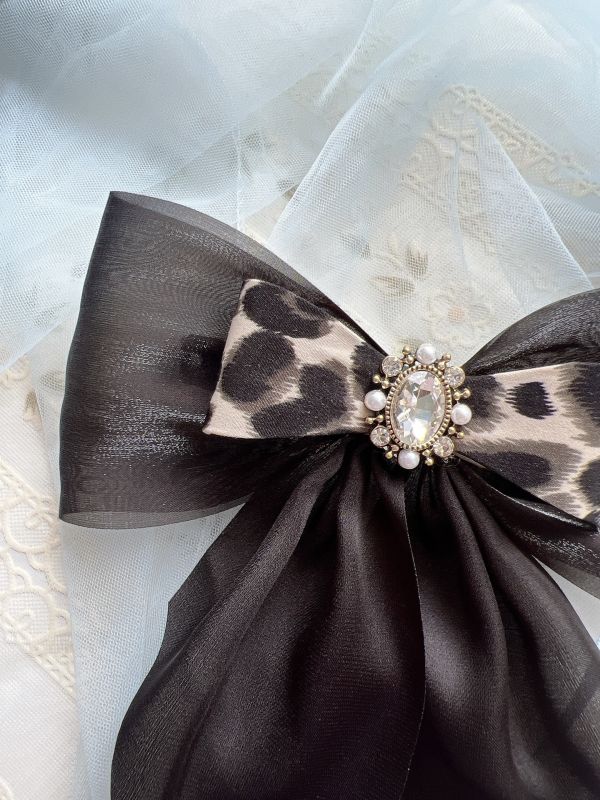 豹紋硬板立體蝴蝶結水鑽雕花彈跳夾 