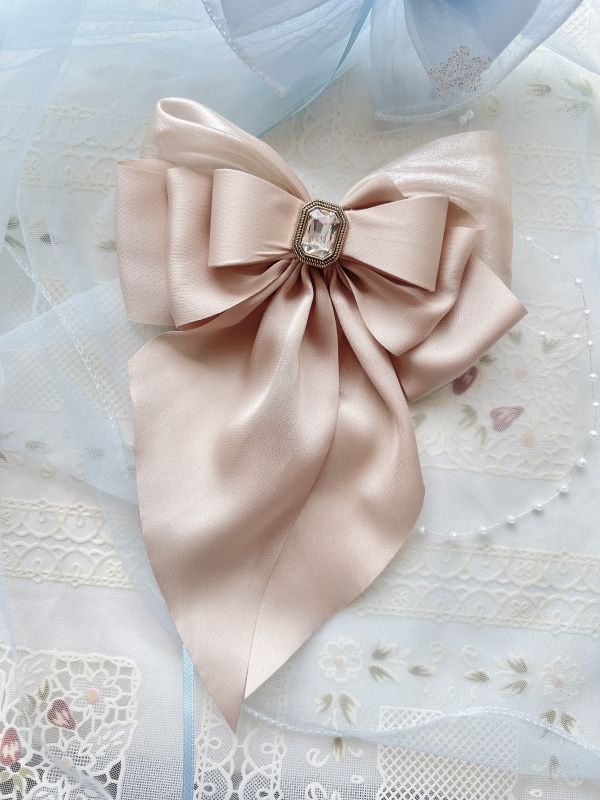 硬板立體蝴蝶結水鑽雕花彈跳夾 