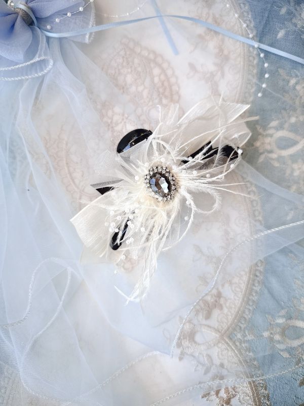 白雪紛飛花型羽毛華麗抓夾 