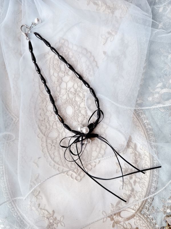 黑色高雅水晶珍珠交織蝴蝶結設計項鍊 