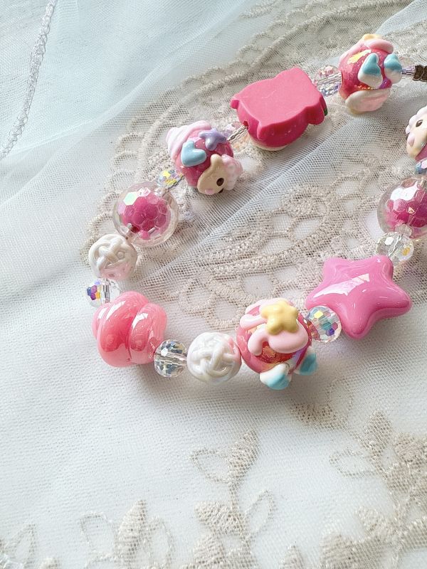 桃色糖果色串珠抱哥手機吊飾/掛墜 