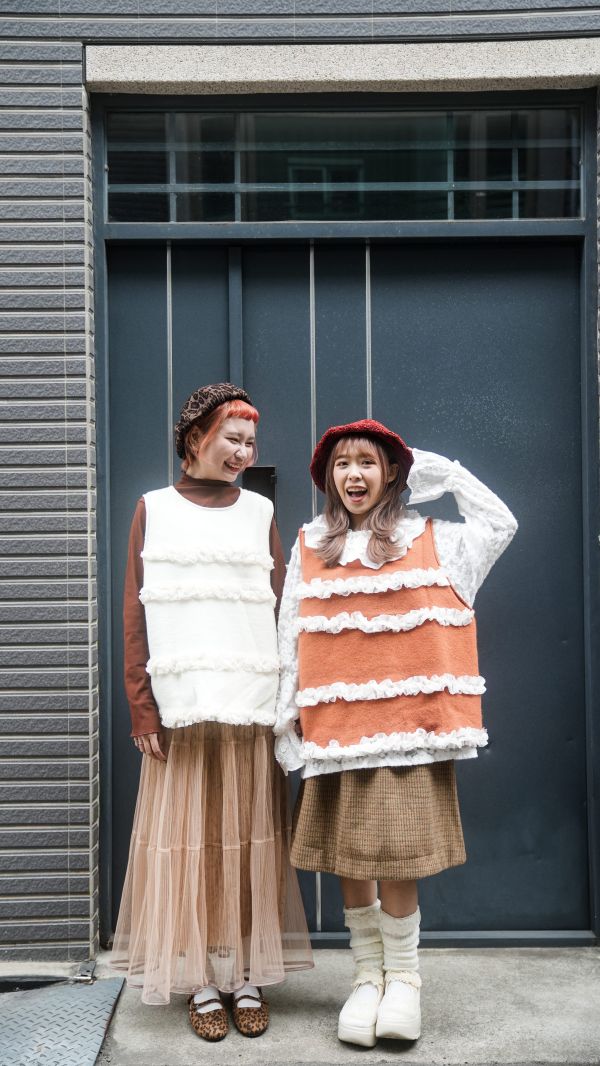 A09層層雪花毛背心 