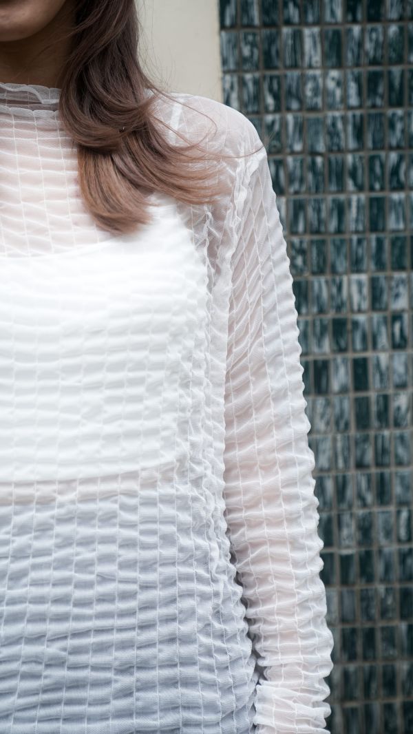 A39泡泡透膚打底衣 