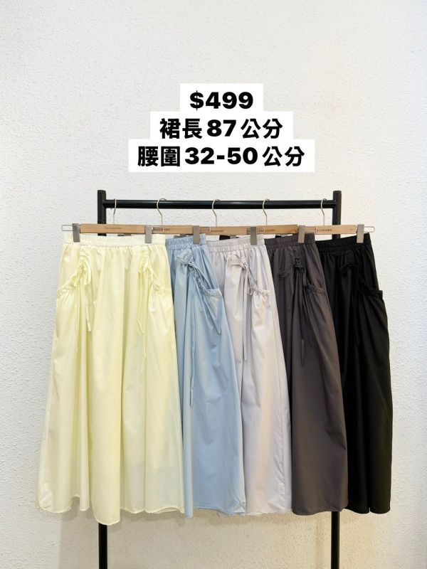 口袋蝴蝶結A字長裙 