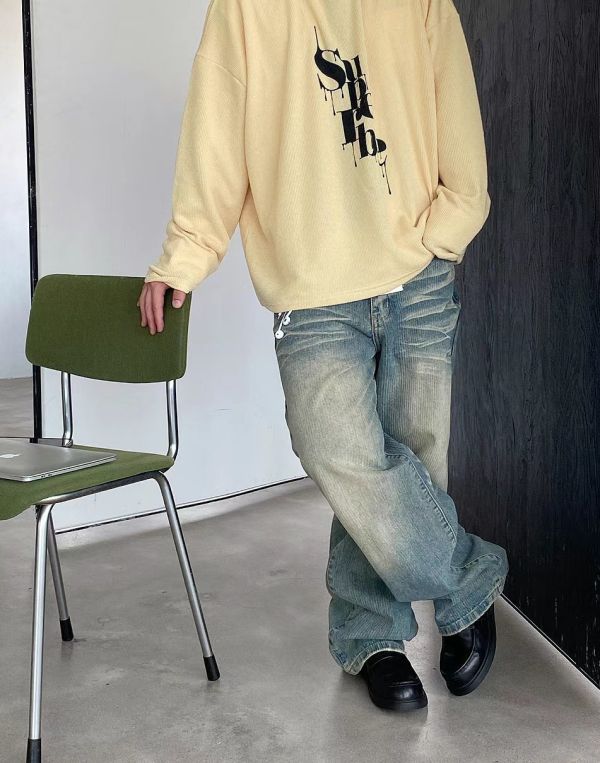 復古人字紋刷色牛仔褲 