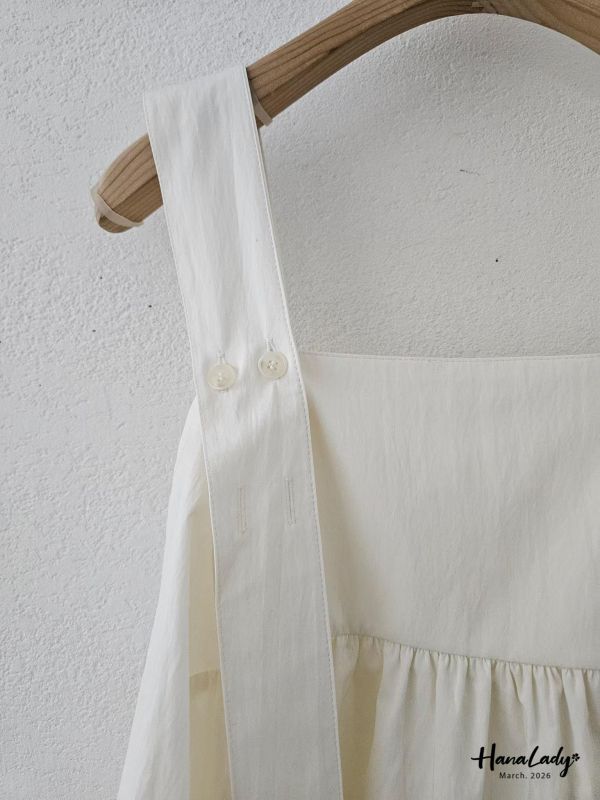 LSA15 方領釦帶肩設計裙襬上衣 