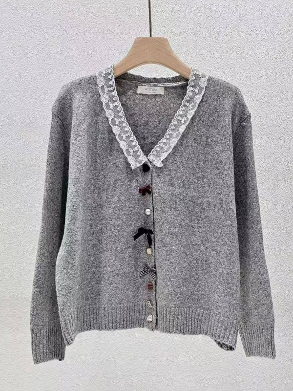 WQA28 超特別造型扭釦針織上衣 