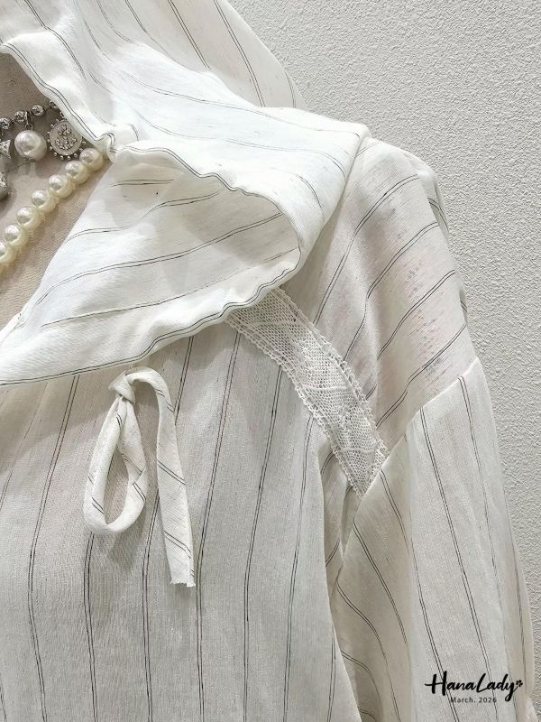 LSA07 可愛Q擺線條排釦衫 