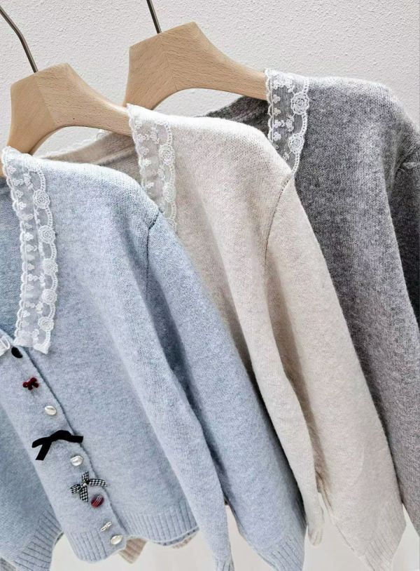 WQA28 超特別造型扭釦針織上衣 