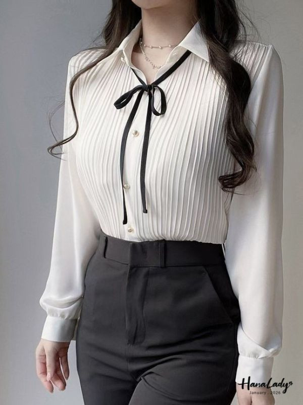 LEA27 造型金扣雪紡壓紋上衣 