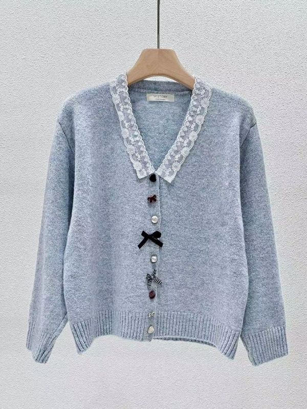 WQA28 超特別造型扭釦針織上衣 