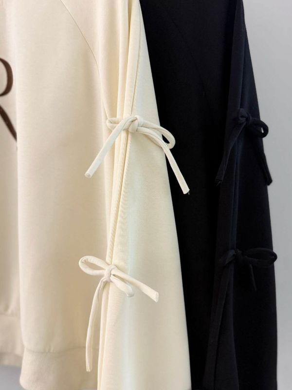 WQA24 造型雙邊蝴蝶綁帶袖上衣 