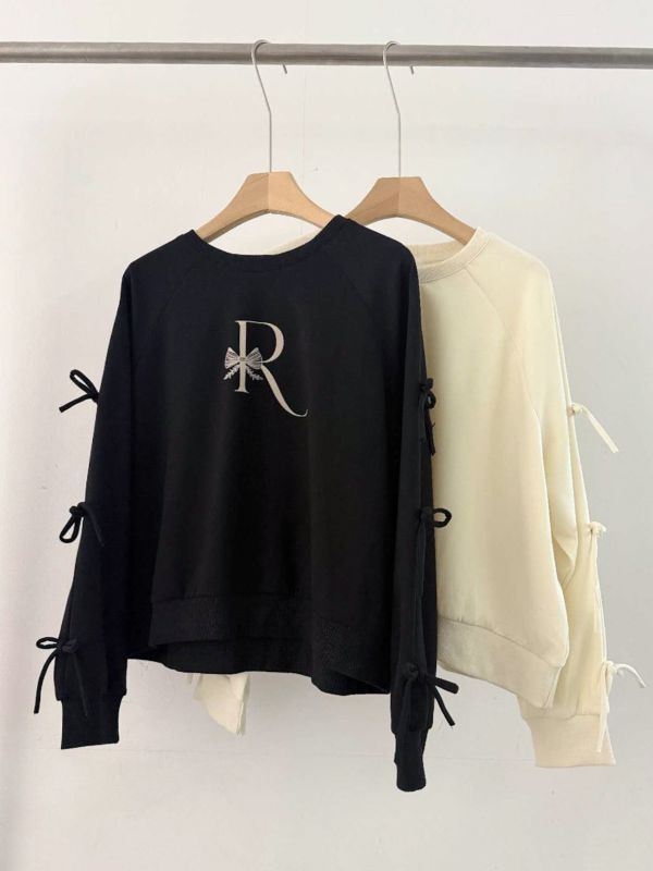 WQA24 造型雙邊蝴蝶綁帶袖上衣 