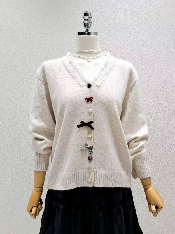 WQA28 超特別造型扭釦針織上衣 