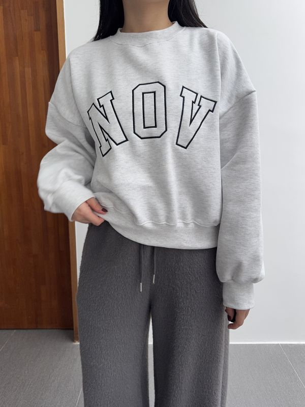 NOV低調拼接大學T 