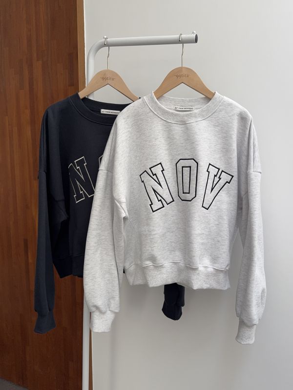 NOV低調拼接大學T 