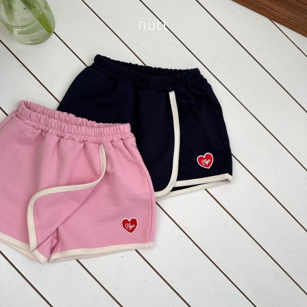 滾邊愛心刺繡布標褲裙 