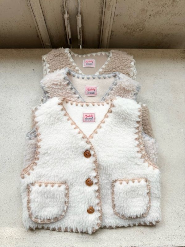 小熊系縫線邊絨毛口袋背心 