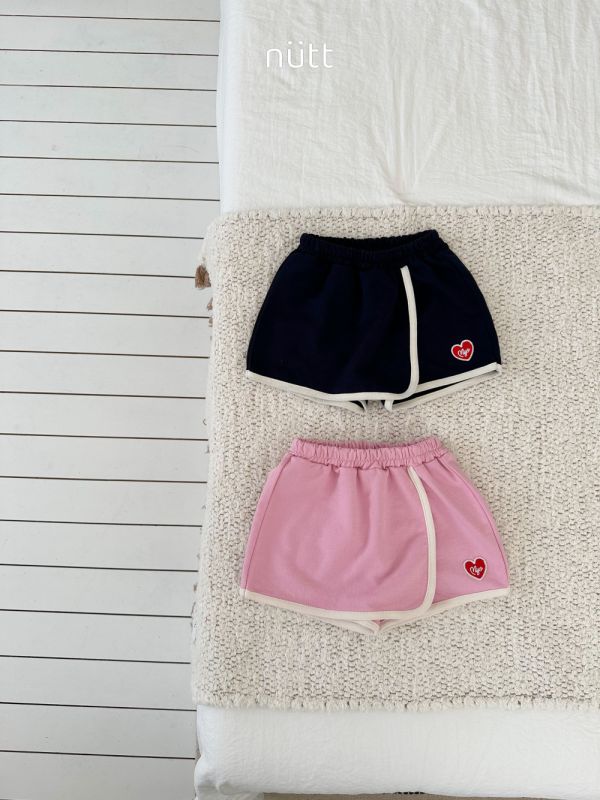 滾邊愛心刺繡布標褲裙 