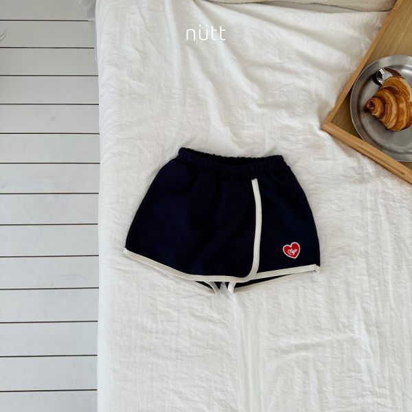 滾邊愛心刺繡布標褲裙 