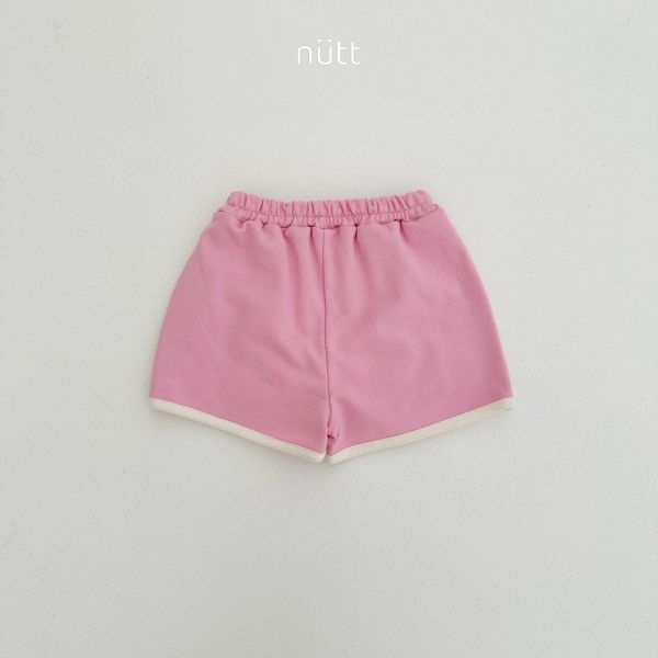 滾邊愛心刺繡布標褲裙 