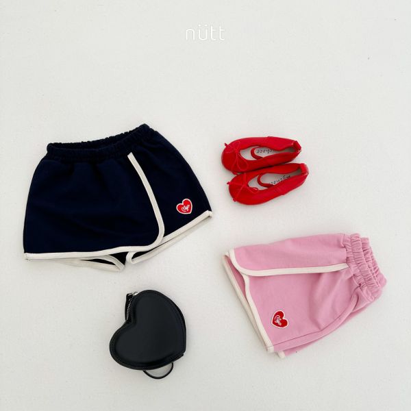 滾邊愛心刺繡布標褲裙 