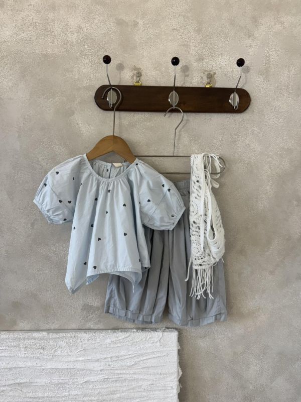 設計款！不規則下襬愛心上衣 