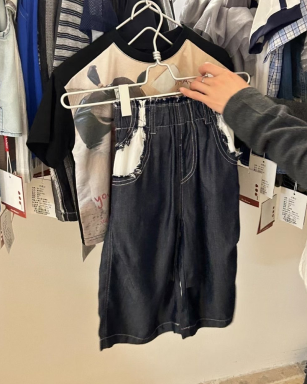 特色毛邊口袋外縫線天絲棉牛仔褲 