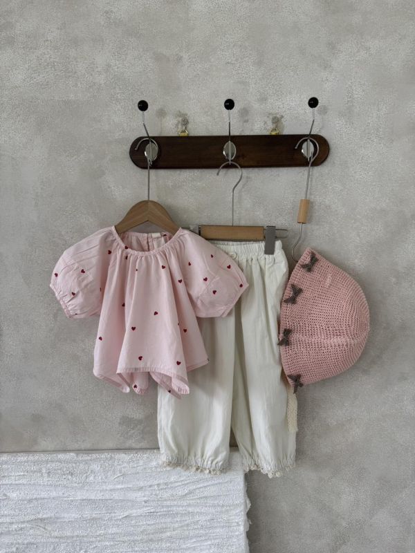 設計款！不規則下襬愛心上衣 