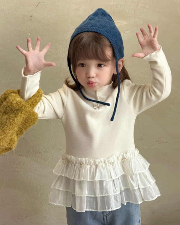 浮誇層次荷葉邊拼接純色磨毛上衣 