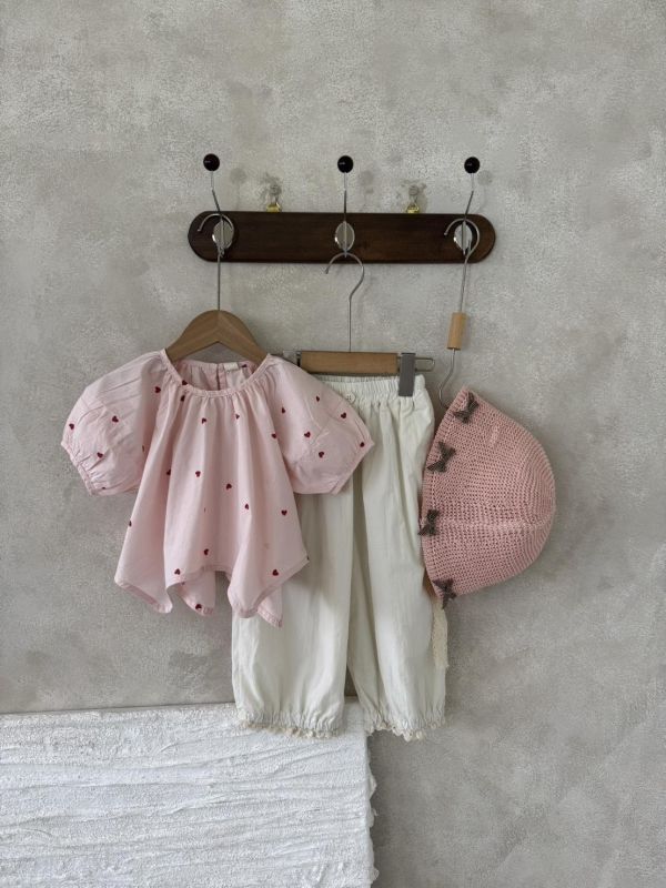 設計款！不規則下襬愛心上衣 