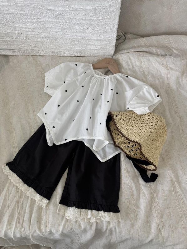 設計款！不規則下襬愛心上衣 