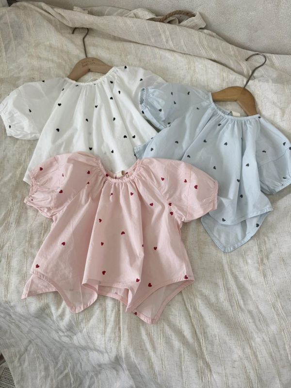 設計款！不規則下襬愛心上衣 