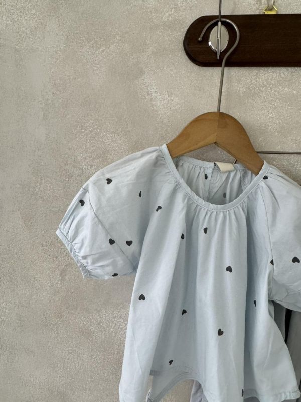 設計款！不規則下襬愛心上衣 