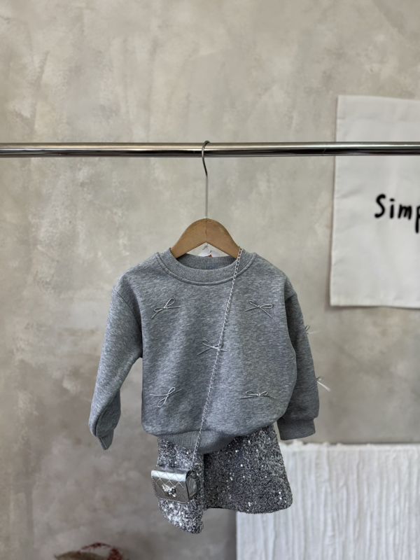 華麗走春！蝴蝶結大學T亮片短裙套裝(含銀色小包) 