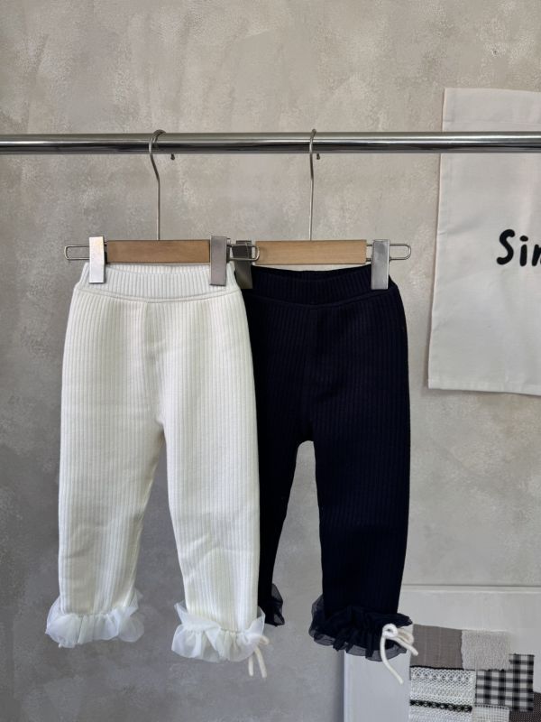 仙女的拼紗坑條蝴蝶結微刷毛內搭長褲 