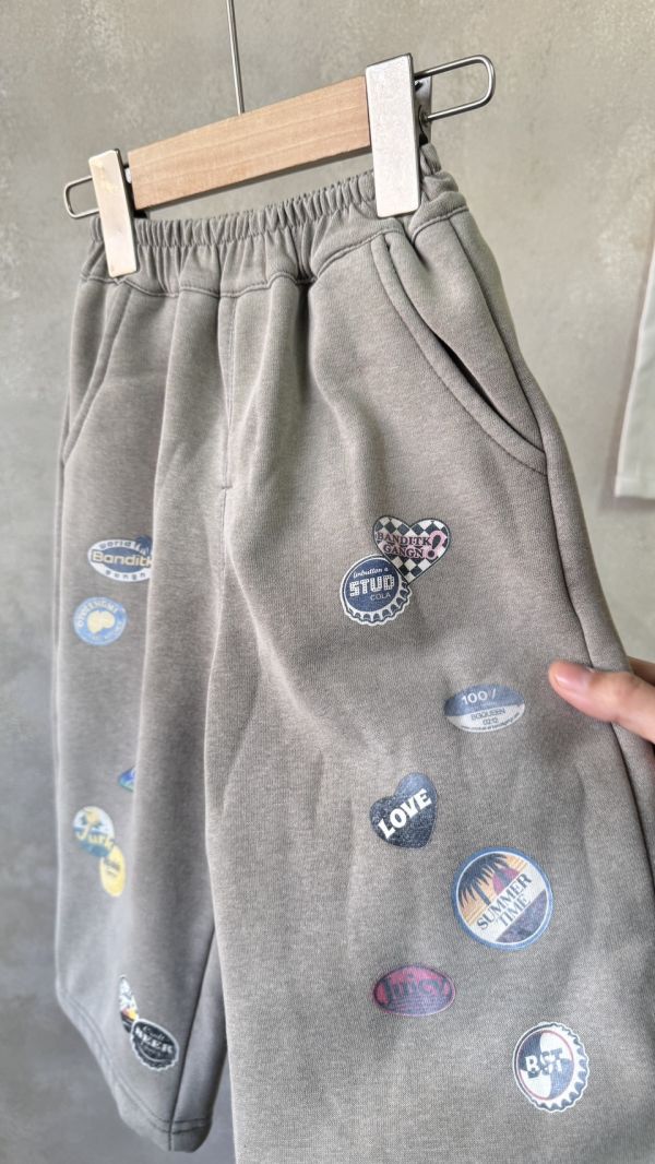 水洗刷色美式復古標章休閒刷毛棉褲 