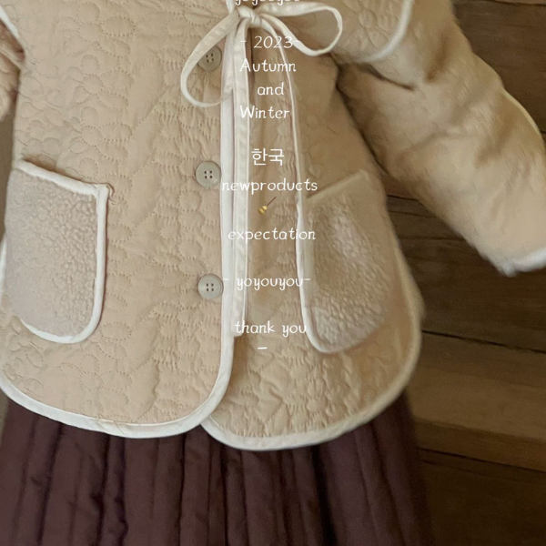 甜美立體壓摺鈕扣側綁帶外套 