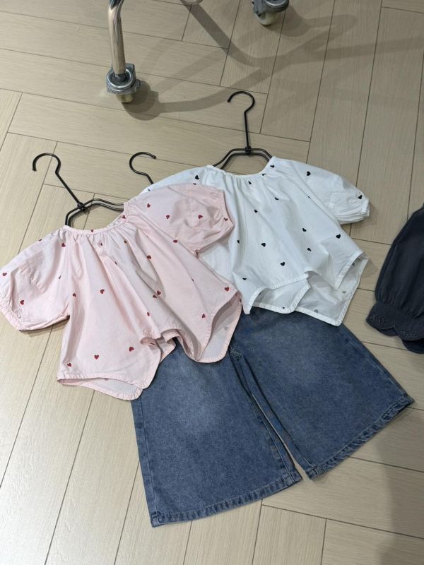 設計款！不規則下襬愛心上衣 