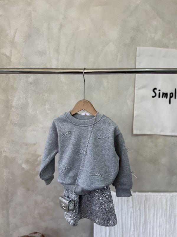 華麗走春！蝴蝶結大學T亮片短裙套裝(含銀色小包) 