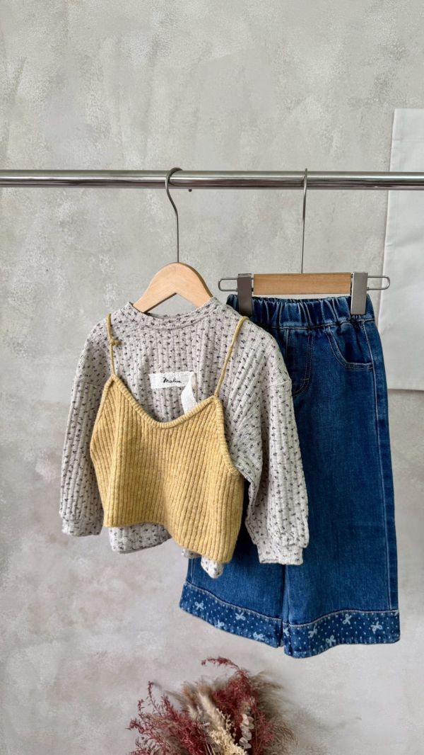 秋冬裡的亮眼疊搭針織背心 