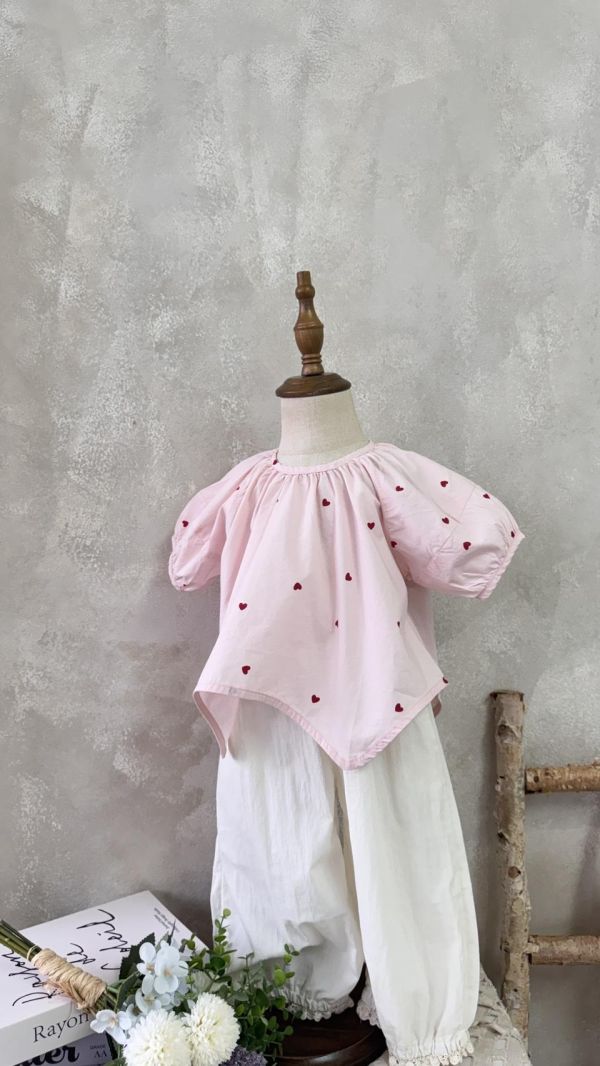 設計款！不規則下襬愛心上衣 