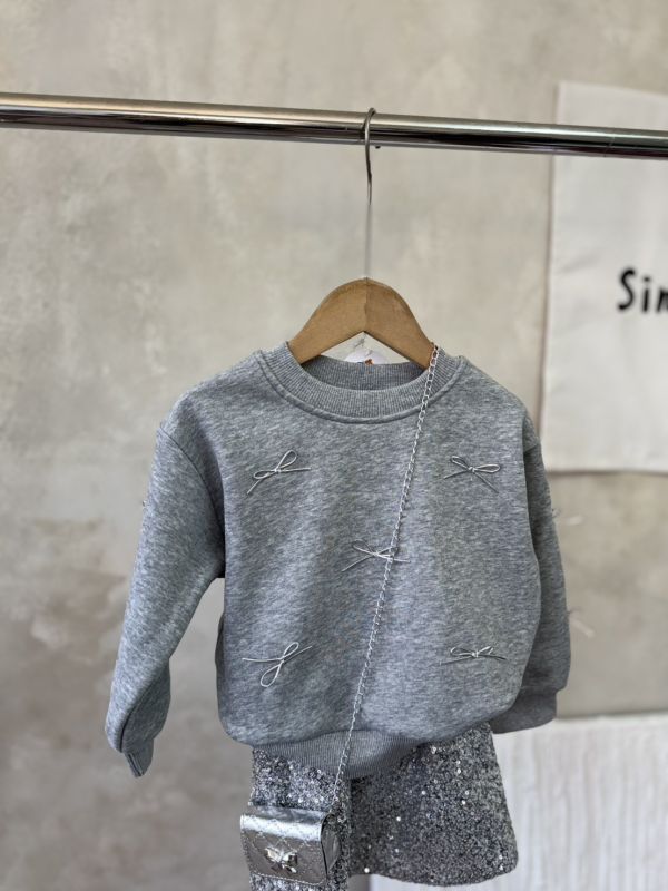 華麗走春！蝴蝶結大學T亮片短裙套裝(含銀色小包) 