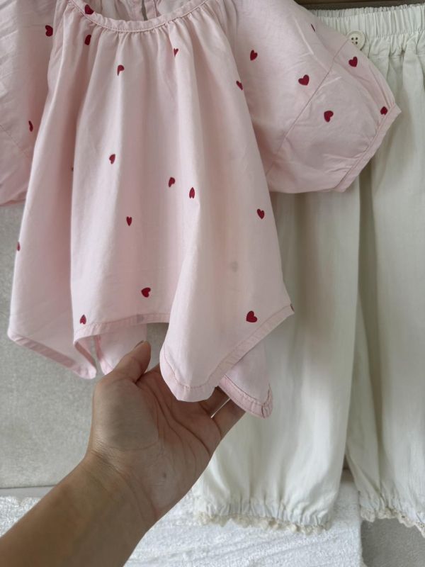 設計款！不規則下襬愛心上衣 