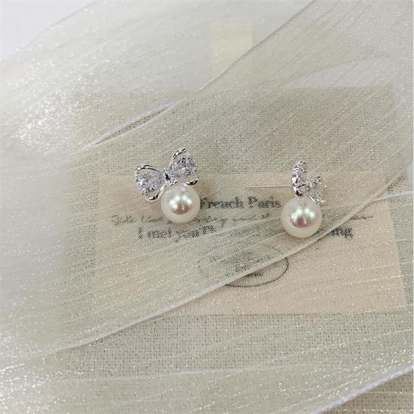 蝴蝶結鑲鑽珍珠耳環 