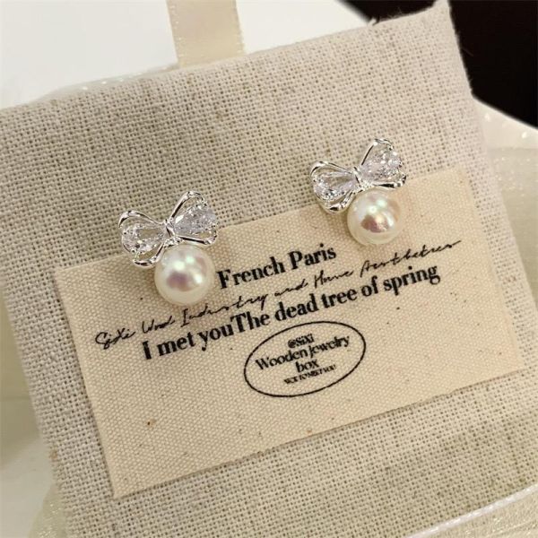 蝴蝶結鑲鑽珍珠耳環 
