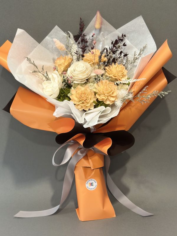 To Sir with Love white sola, orange dahlia, hydrangea, pink and orange sage, matching flowers