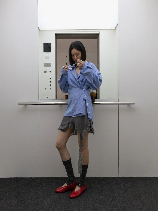 不對稱下擺蕾絲拼接裙 